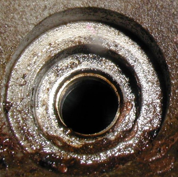 File:Engine-image-NOT-helicoiled-spark-plug-hole.jpg