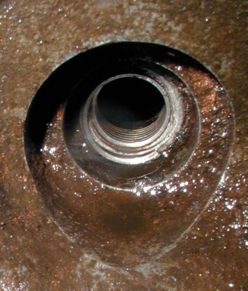 File:Engine-image-helicoiled-spark-plug-hole.jpg
